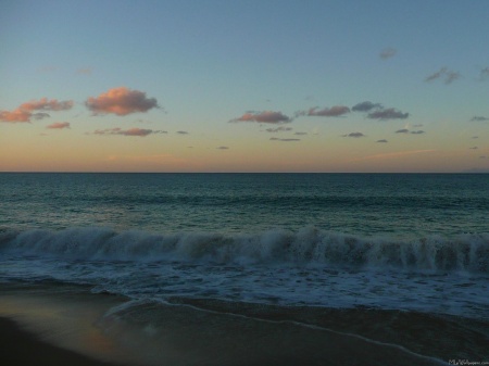 Waves Crashing at Sunset