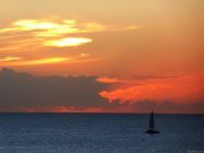 Sunset Clouds and Sailboat
